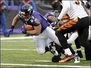 Ravens' running back Ray Rice dives across the goal line on a 7-yard run Sunday as Baltimore beat Cincinnati 13-7.