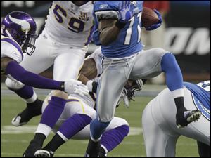 Lions wide receiver Stefan Logan breaks through the Minnesota defense after a catch Sunday in Detroit. Detroit goes into the offseason with its longest winning streak since 1999.