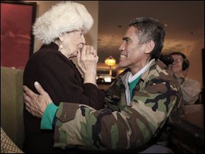 The homeless man with the golden voice, Ted Williams, is reunited with his mother, Julia Williams, 90, in New York Thursday. Williams, who was living in a tent near a highway in Columbus, Ohio, just days ago, became an online video sensation when the Columbus Dispatch posted a video of him speaking in his deep baritone voice on its Web site this week.