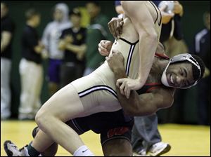 Wauseon's Nick McCall takes down Perrysburg's Luke Boff in the 171-pound final at the Maumee Bay Classic at Clay. McCall, who has placed at the state tournament two times, has a 25-2 record this season.