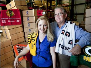 Gregg McArthur, with his daughter Lexie McArthur, has sold the Pittsburgh Steelers' 'Terrible Towel' since 1997. McArthur Towel & Sports also is making a 'Titletown Towel' for Packers fans at the Super Bowl.