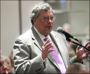Steve Herwat, Deputy Mayor of Operations for Toledo, asks Ohio Gov. John Kasich a question.