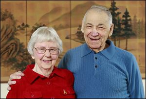 Emily and Robert Guion of Bowling Green, who have been married for 63 years, have for years helped with the Wheeled Meals program at Wood County Hospital. Their family is also known for candy gifts.