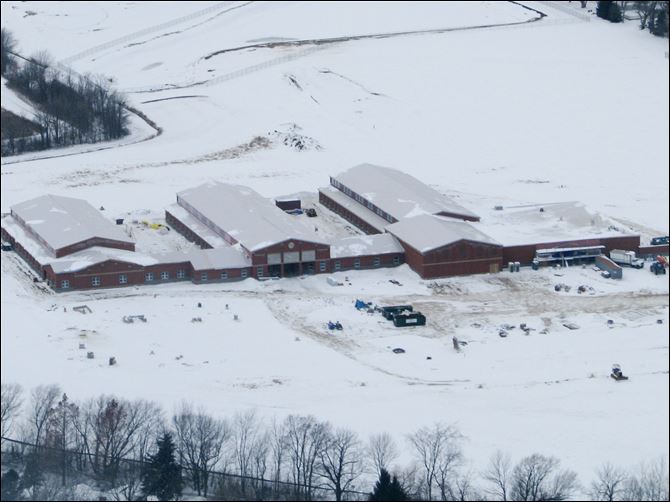 Construction is proceeding with Genoa schools' $24.4 million kindergarten-through-fifth-grade building that is to be finished in mid June. It is to replace two buildings.