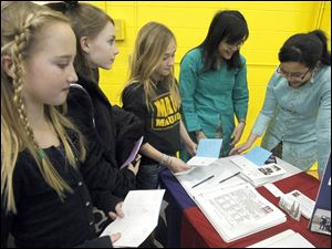 From left, Madison Williams, Kennedy Togrum, Bri Boyd, Najim Roslan, Malaysia and Annie Isdarmadji.