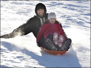 Jason McMillion and daughter Hailey, 9, of Rossford.