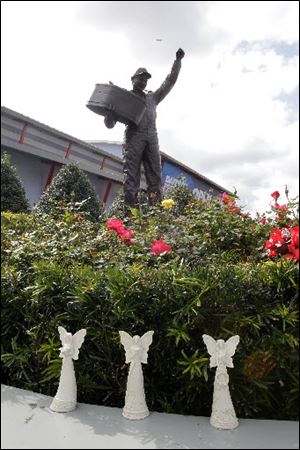 The statue of Dale Earnhardt that stands outside of Daytona International Speedway has been adorned with three small white angel figurines this week by an unknown person. It's just a small reminder that Saturday is the 10th anniversary of the death of the legendary NASCAR driver.