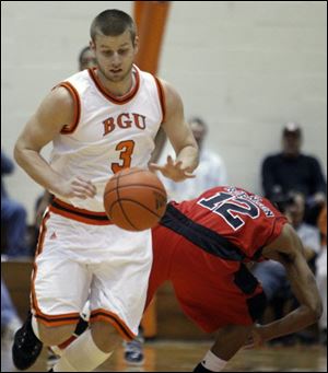 Bowling Green State University guard Luke Kraus (3) steals the ball from Ball State's Tyrae Robinson (12) in a game earlier this month.