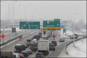 Falling ice forced the closure of the Veterans' Glass City Skyway. Southbound traffic was halted for about an hour and northbound lanes were closed for most of the day.