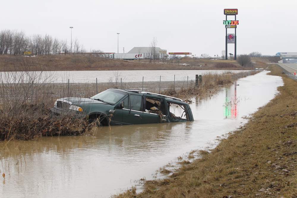 SUV-stuck-in-ditch-613