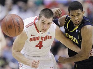 Ohio State guard Aaron Craft, left, and Michigan guard Darius Morris chase a loose ball.