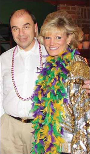 Tom and Traci Schwann enjoy the festivities at the Sordyls' party.