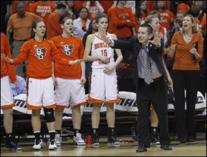 BGSU coach Curt Miller questions a push call by the ref during 2011 Mid-American Conference women's basketball final against Eastern Michigan at Quicken Loans Arena in Cleveland.