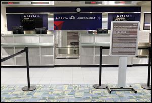 Delta's ticket counter is ready for customers who won't be showing up.