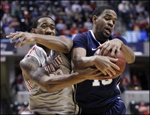 David Lighty battles Penn State's David Jackson. Lighty says the win was a step toward the team's goal of being NCAA champions.