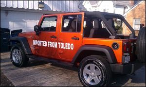 This Wrangler from Grogan'sTowne and Charlie's Chrysler Dodge Jeep Ram showed the modified slogan to Walleye fans. 