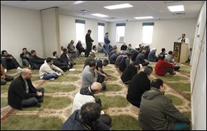 Worshippers gather at the Toledo Muslim Community Center on West Sylvania Avenue for Friday Juma prayers.