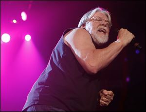 Bob Seger digs into one of the songs from his 26-song set Thursday night at the Huntington Center.