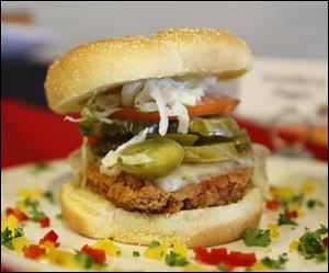 The Flaming Muddy is a deep-fried chicken breast with pepper jack cheese and jalapenos on a bun.
