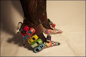 Miniature cars adorn these funky heels.