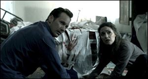 Patrick Wilson, left, and Rose Byrne are shown in a scene from 