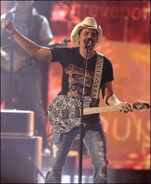 Brad Paisley, top male vocalist, helps open the show.