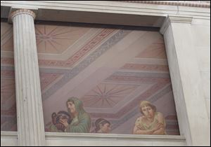On the upper story of the Peristyle lobby, a painted frieze depicts Greek citizens watching the activity below.