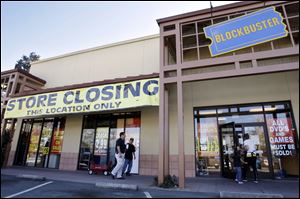 The video-rental chain that includes this store in Palo Alto, Calif., once dominated the U.S. movie-rental business. It plans to close about 700 of its remaining 2,400 stores.