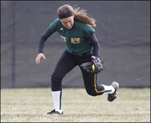 Clay's Danielle Holmes fields a ball in warmups before the Eagles' recent game against Perrysburg. The senior was the City League's third-leading hitter last season.