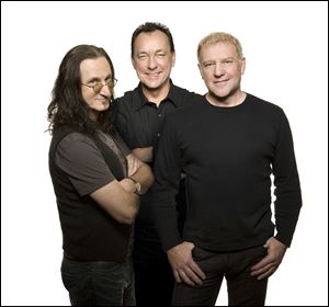 Rush members, from left, Geddy Lee, Neil Pert, and Alex Lifeson.