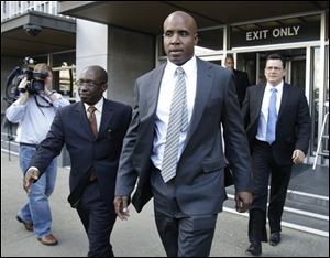 Barry Bonds leaves a federal courthouse during his perjury trial, Friday in San Francisco.