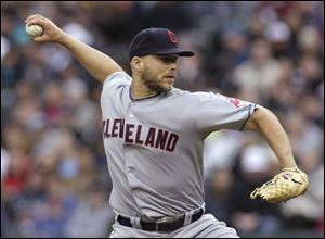 Cleveland starting pitcher Justin Masterson throws against the Seattle Mariners in the first inning.