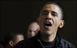 President Barack Obama speaks to visitors at the Lincoln Memorial.