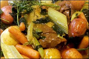 Beef Brisket with vegetables and gravy is often served at Passover's seder dinner
