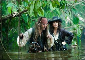 Johnny Depp, left, and Penelope Cruz are shown in a scene from, 'Pirates of the Caribbean: On Stranger Tides.' 