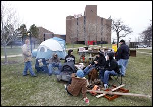 Owens Community College and Bowling Green State University students prepare to spend a night under the stars to raise homeless awareness.