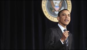 President Barack Obama outlines his fiscal policy Wednesday during an address at George Washington University in Washington.