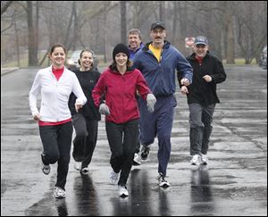Some of the Gateway Middle School staff members who will run in the Glass City Marathon are, from left, Angie Sugg, assistant principal; Laura Martin, sixth and eighth grade reading teacher; Trinity Gawron, seventh grade language arts teacher; Mike Dick, seventh grade science teacher; Dave Schetzsle, eighth grade U.S. history teacher, and Joel Hefner, sixth grade teacher.
