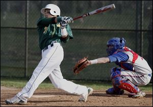 Clay's Jesse Castilleja drives in a run against St. Francis as the Eagles improved to 2-0 in the City League.