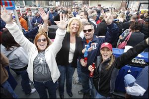 From left: Lauren Kurth, Jackie Klempner, Tim Fisher, and Jennifer Fisher enjoy a pre-game drink on the patio of Jed's downtown before the Mud Hen's home opener at Fifth Third Field on April 14, 2011.