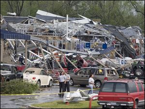 This Lowe's is one of several businesses in ruins in Sanford, N.C, as a storm system kicked up tornadoes, flash floods, and hail as big as softballs throughout the South. Sixty-two tornadoes were reported in just North Carolina.