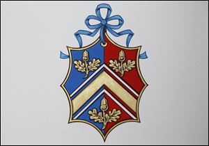 Kate Middleton will be able to use the new Coat of Arms for her family until her wedding to Britain's Prince William, when it will be merged with his Coat of Arms. Kate's heraldic design features a tied ribbon to show she is an unmarried woman and the overall shape is an elaborate lozenge - a shield would be used for Middleton men.