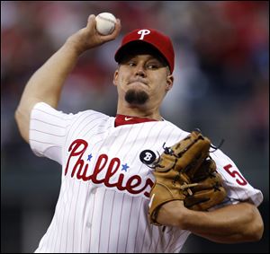 Philadelphia Phillies starting pitcher Joe Blanton throws Monday during the first inning of a baseball game against the Milwaukee Brewers in Philadelphia.