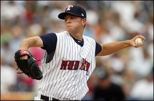 Toledo Mud Hens pitcher Andrew Oliver fires in a pitch.