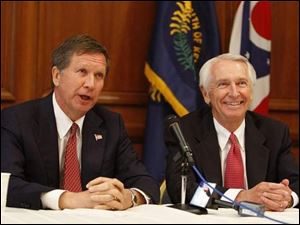Ohio Gov. John Kasich, left, and Kentucky Gov. Steve Beshear meet Tuesday to discuss issues of concern for both states such as the flow of narcotic drugs, the rebuilding of the Brent Spence Bridge, and rebuilding the Greater Cincinnati/Northern Kentucky International Airport. 