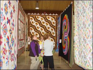 Quilts will be on display in Founders Hall at Sauder Village through May 1.