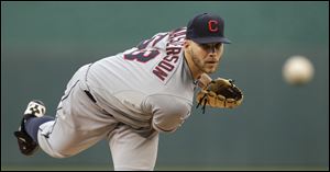 Cleveland Indians starting pitcher Justin Masterson watches a throw during the first inning against the Kansas City Royals on Wednesday.