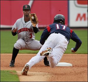 Toledo Mud Hens shortstop Cale Iorg is caught stealing as Indianapolis shortstop Pedro Ciriaco waits to make the tag during the fifth inning Wednesday at Fifth Third Field in Toledo.