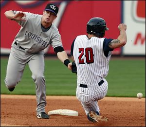 Toledo's Scott Sizemore steals second base against Louisville shortstop Zack Cozart (7) during the fourth inning.