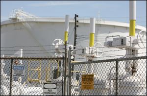 Cygnet, Ohio, is now home to a tank farm run by Mid Valley Pipeline Co. During its oil boom, hotels rented beds used for no more than 12 hours at a time, rotated between workers on day and night shifts.